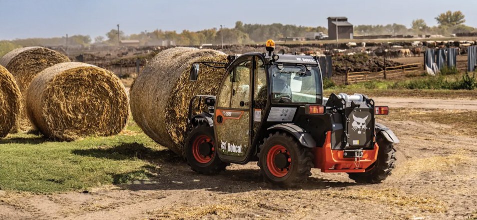 Bobcat TL519 Telehandler Moving Bales of Hay