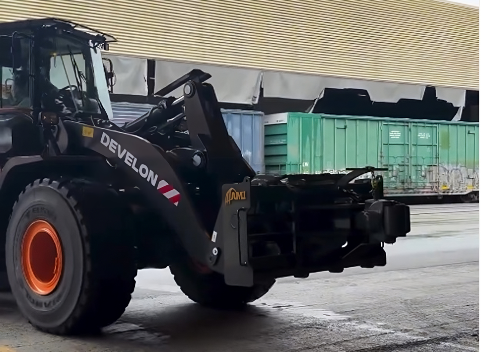 How A Rail Knuckle Attachment Can Turn Your Wheel Loader into a Rail Car Transporter